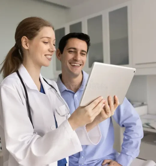 doctor-patient-looks-tablet-screen-joyful-expression-smiling-look-optimistic-reviewing-data-good-check-up-health-411232786